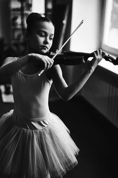 Little girl in tutu playing violin — Stock Photo, Image