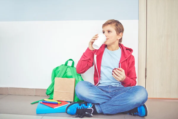 Youngster having snack — Stock Photo, Image