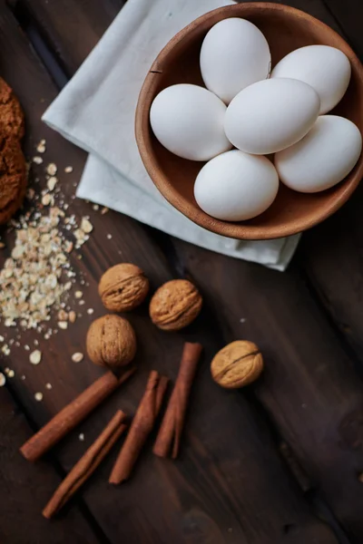 Eggs, walnuts and cinnamon — Stock Photo, Image