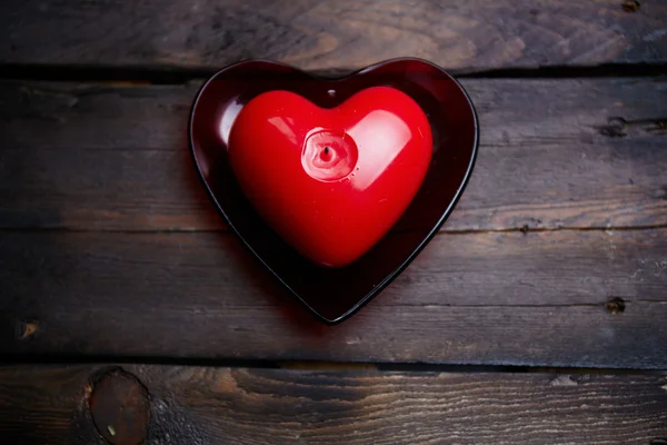 Red heart shaped candle — Stock Photo, Image