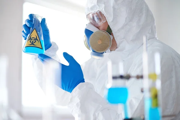 Scientist in protective overall — Stock Photo, Image