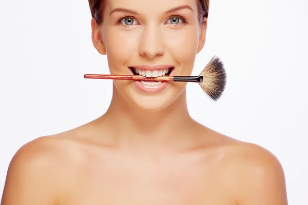 Girl with powder brush — Stock Photo, Image