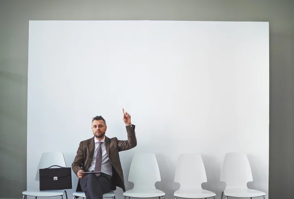 Confident man with touchpad — Stock Photo, Image