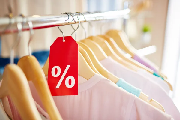 Clothes on hangers for sale — Stock Photo, Image