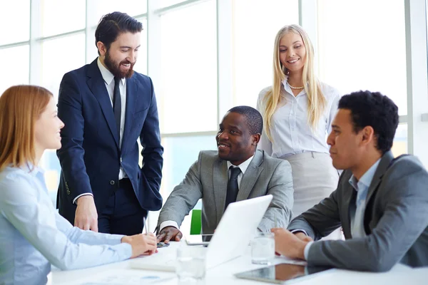 Positive workers at meeting — Stock Photo, Image