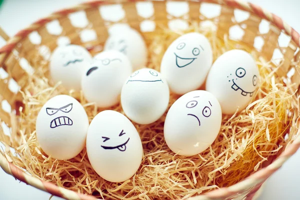 Basket with funny eggs — Stock Photo, Image