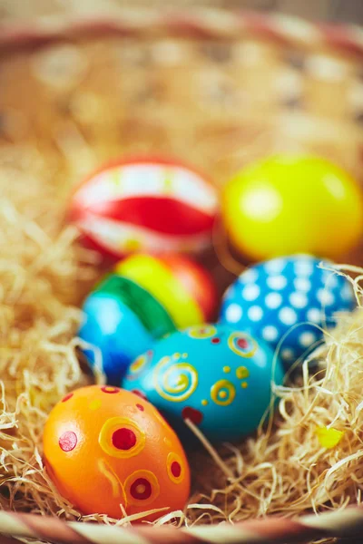 Easter eggs in hay nest — Stock Photo, Image