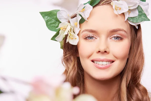Woman with floral wreath on head — Stock Photo, Image
