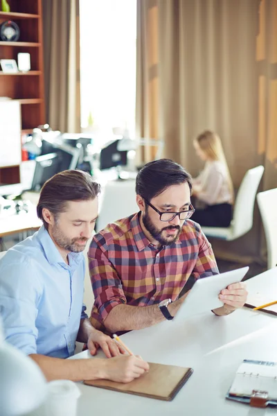 Confident businessmen at meeting — Stock Photo, Image