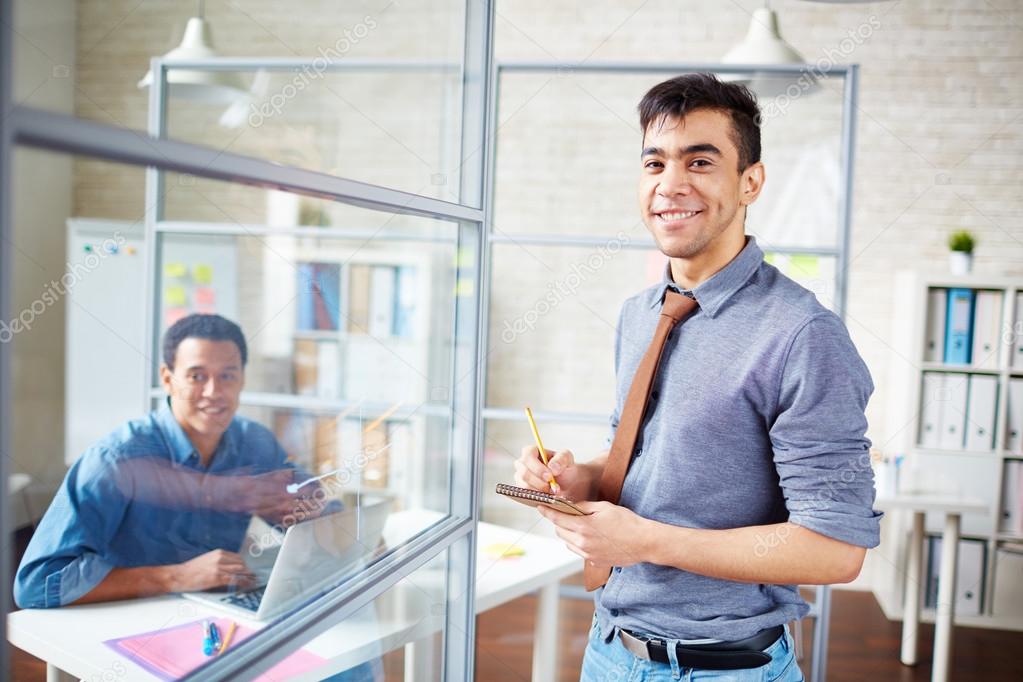 businessman making notes in office