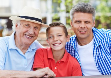 senior man, his son and grandson clipart