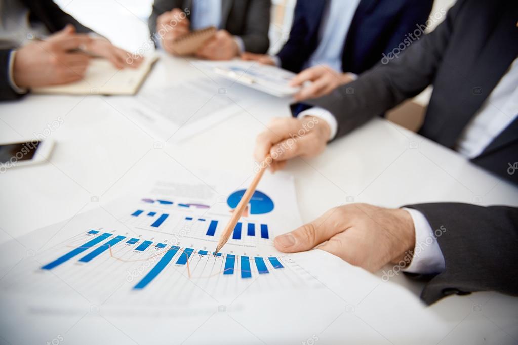 Businessman pointing at  financial data