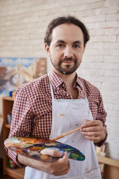 Artist with paintbrush and palette — Stock Photo, Image