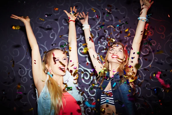 Girls dancing with raised arms — Stock Photo, Image