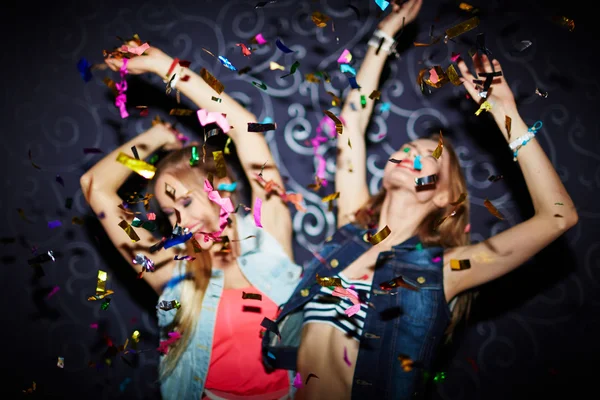 Girls dancing with raised arms — Stock Photo, Image