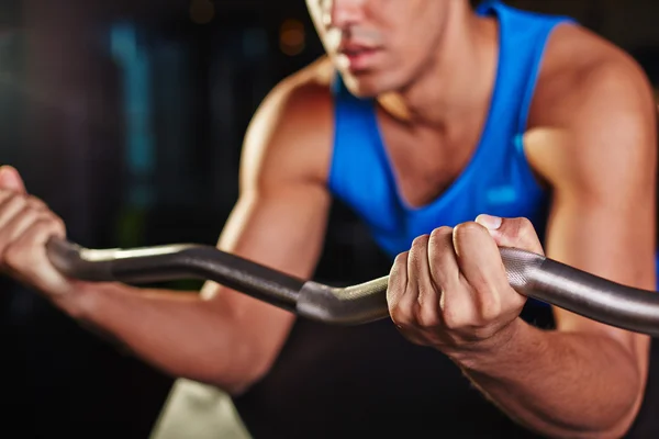 Man lifting weight during workout — Stock Photo, Image
