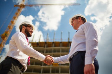 handsome architects making deal