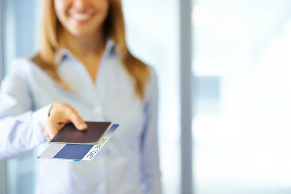 Manager giving passport and air ticket — Stock Fotó