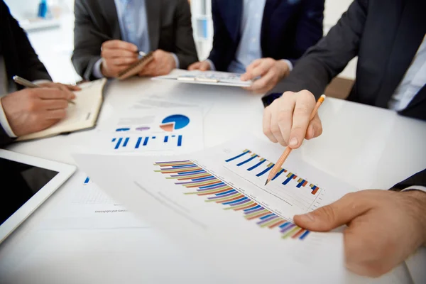 Businessman making financial report at meeting — Stok fotoğraf