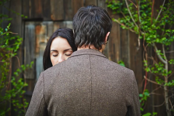 Peaceful woman  standing close to her sweetheart — Stock Photo, Image