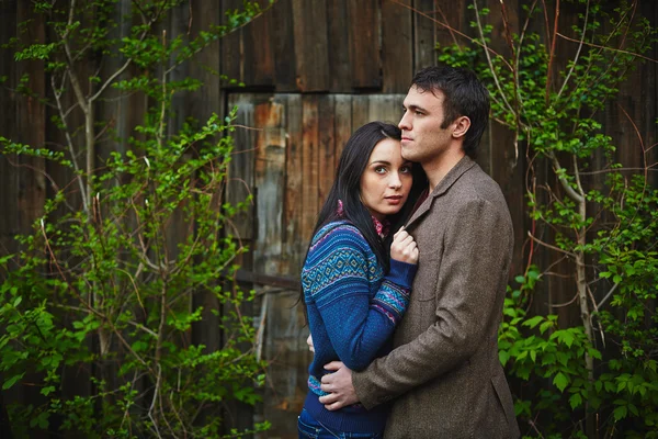 Couple in casual wear embracing — Stock Photo, Image