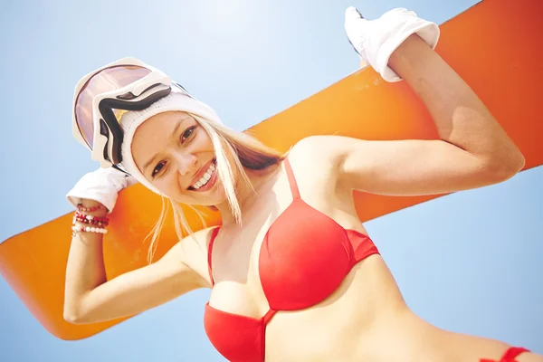 Woman in red bikini with sandboard — Stock Photo, Image