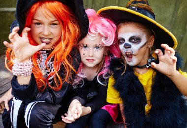 girls in Halloween costumes clipart