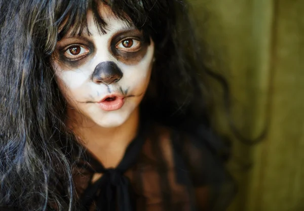 Chica en peluca con la cara pintada —  Fotos de Stock