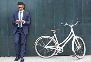 Handsome employee with cellphone