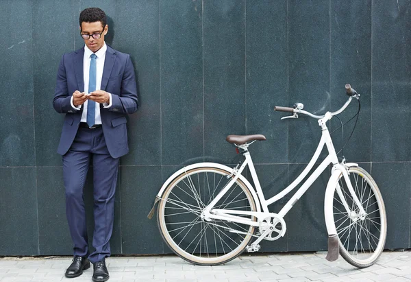 Handsome employee with cellphone — Stok fotoğraf