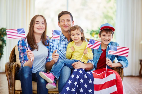 Rodina s Usa příznaky Stock Snímky