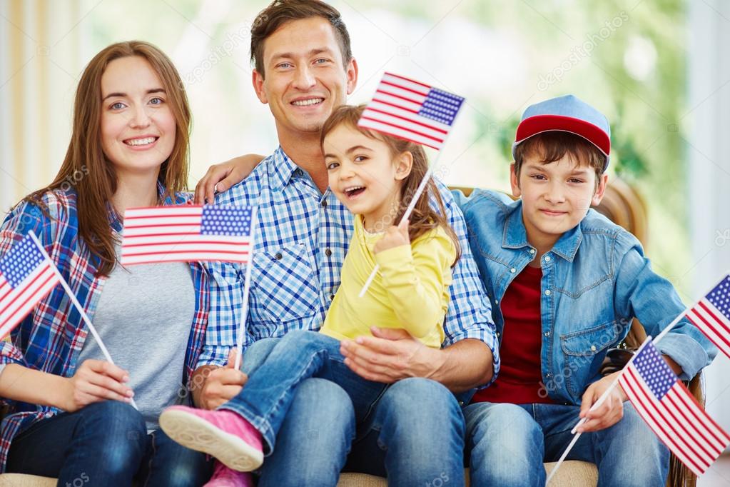 American family with flags