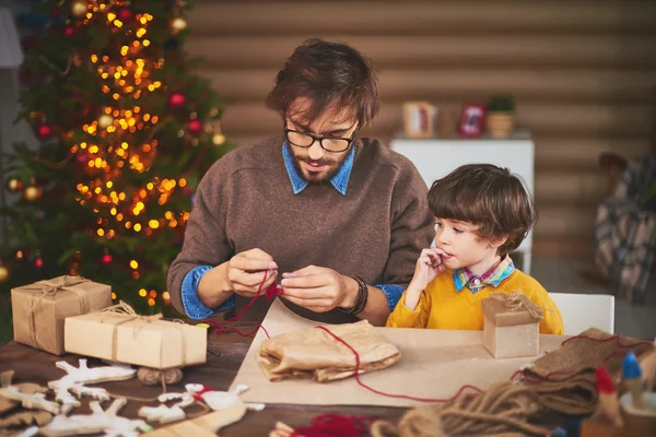 Father and son with gifts — Stock Photo, Image