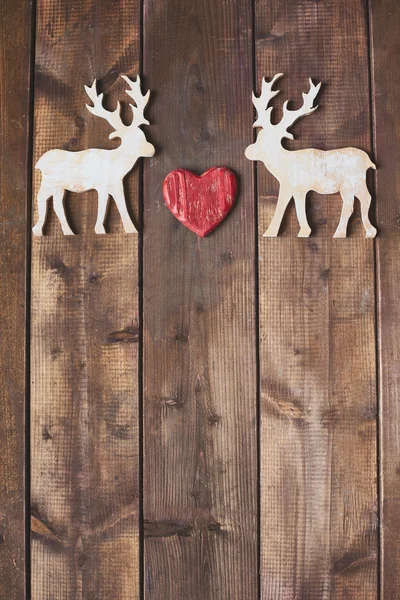 Toy reindeers with heart — Stock Photo, Image