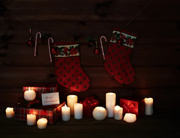 Vánoční ponožky a cukru hole — Stock fotografie