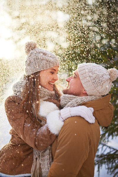Young amorous couple in winter