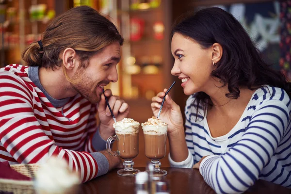 Amorous sweethearts in cafe