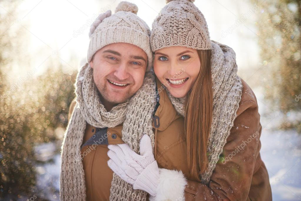 Young amorous couple in winter