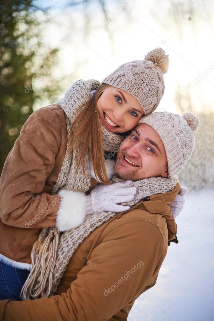 Young amorous couple in winter