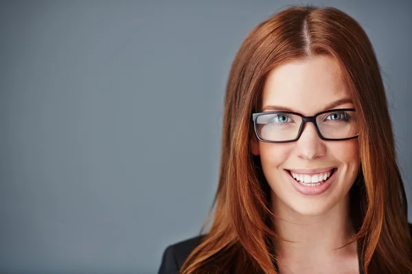 Young businesswoman in eyeglasses — Stock Photo, Image