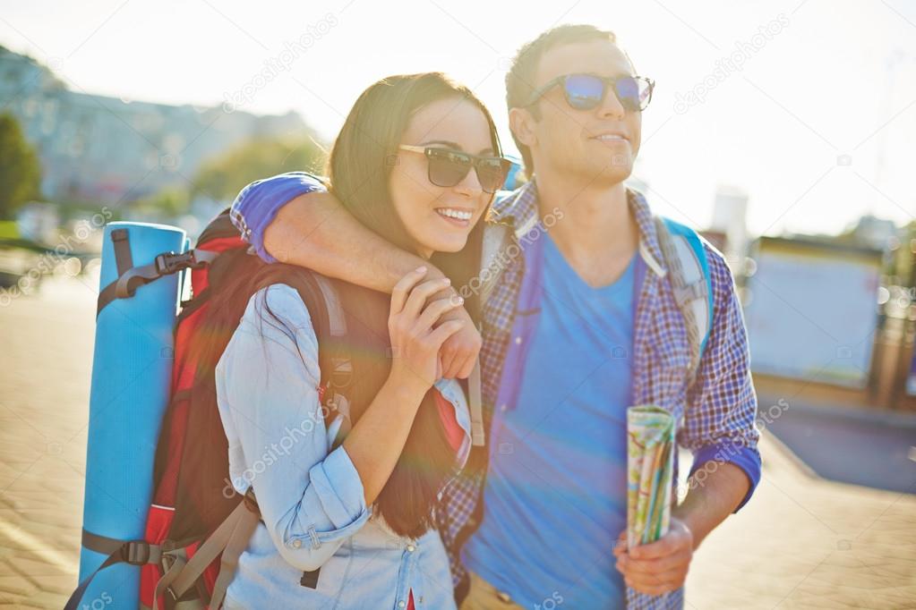 Young couple of travelers