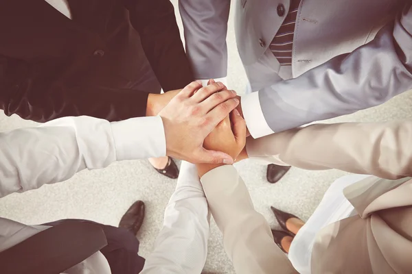Hands of business partners making pile — Stock Photo, Image