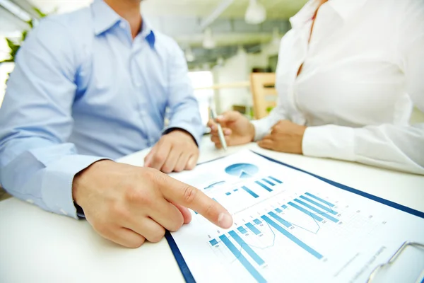 Businessman pointing at chart — Stock Photo, Image