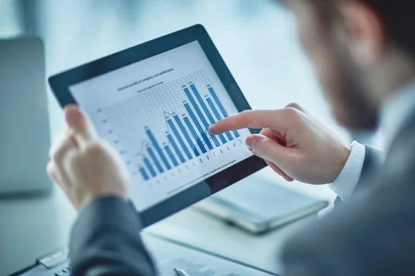 Businessman pointing at electronic document — Stock Photo, Image