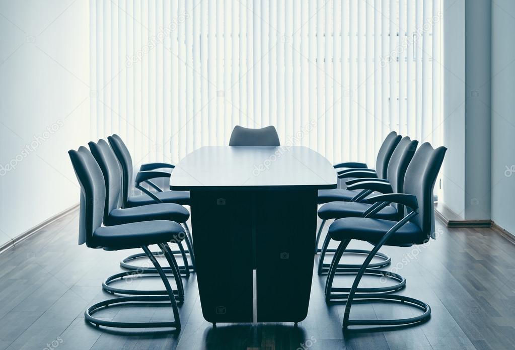 Empty office with table and chairs