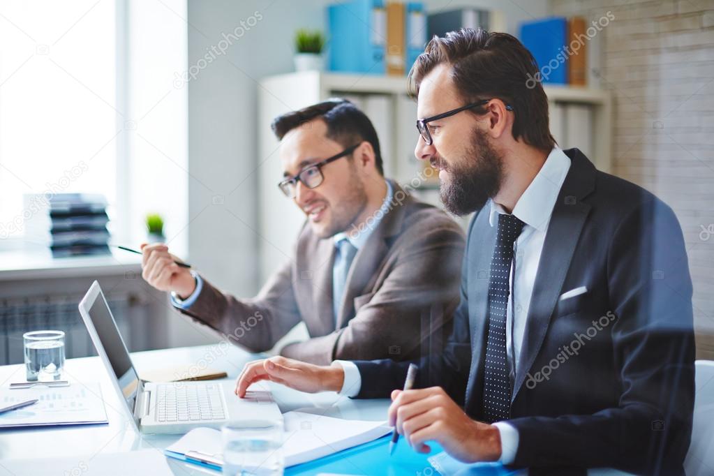 employees planning work at meeting