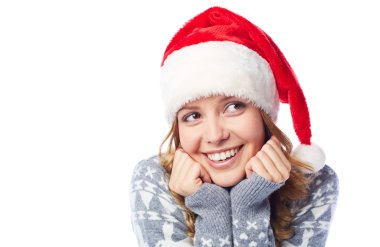 Noel Baba şapkalı neşeli genç kız
