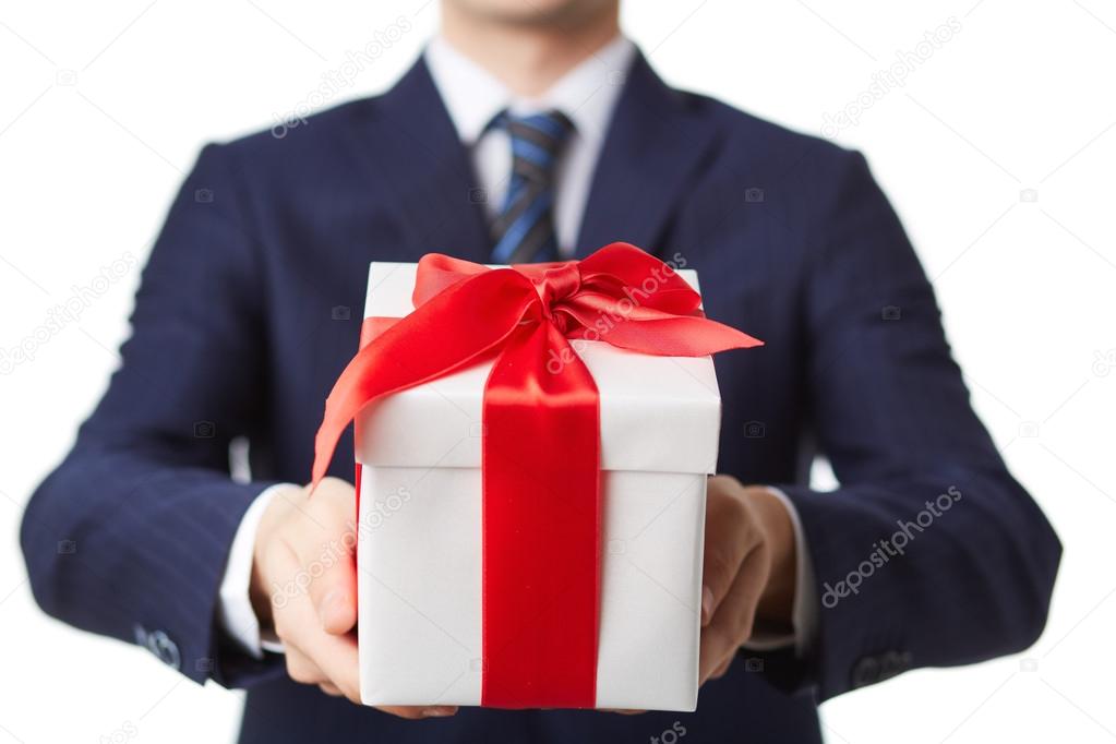 businessman giving package with present