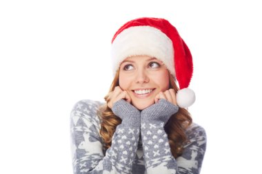 Noel Baba şapkalı neşeli genç kız
