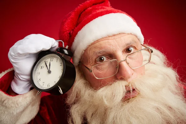 Santa Claus con despertador — Foto de Stock